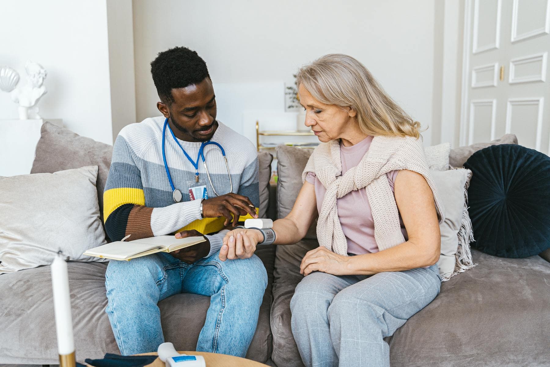 Megacare nurse performing an in-home assessment with a Houston family